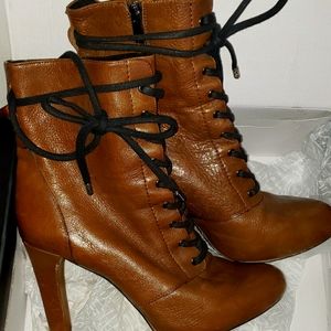 Previously loved INC MID CALF BOOT 4inch heel Olive green.